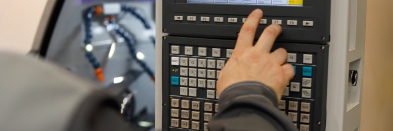 CNC Operator programming lathe machine